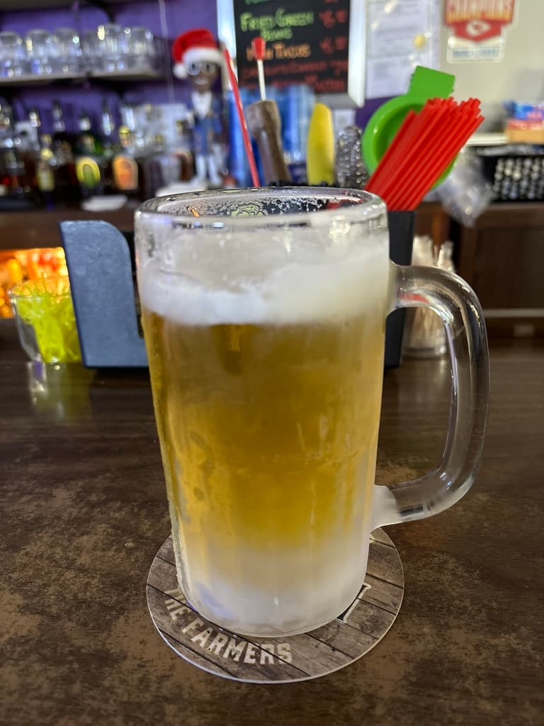 Frosty beer mug at bar